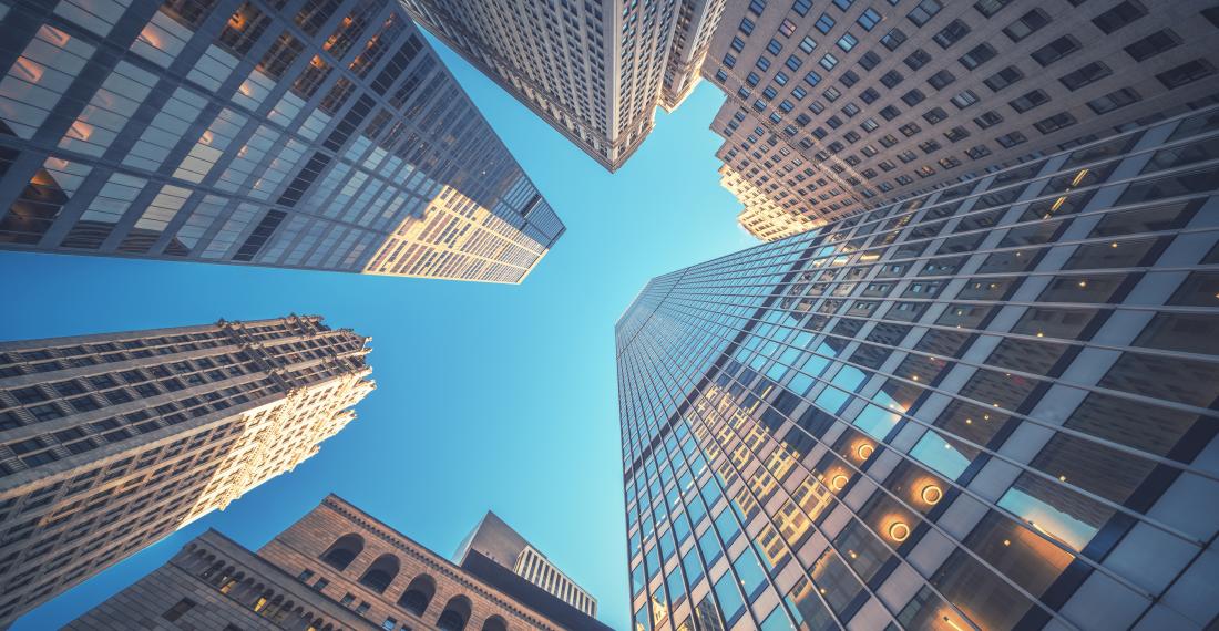 View of skyscrapers, looking up from the street.